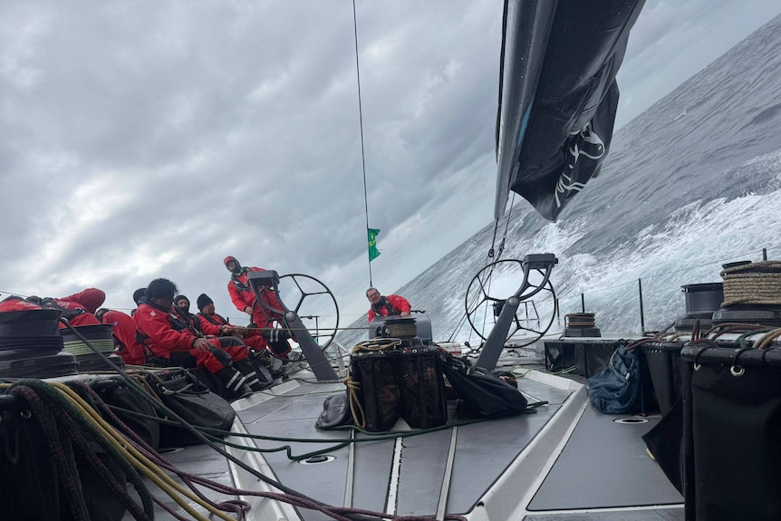 The SHK Scallywag 100 crew at Sydney to Hobart yacht race.