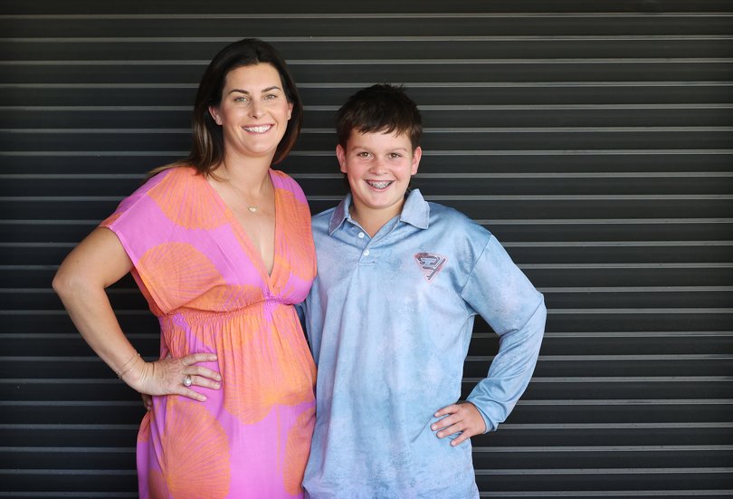 Gus McPherson 11, with mum Erin. Picture: Jackson Flindell