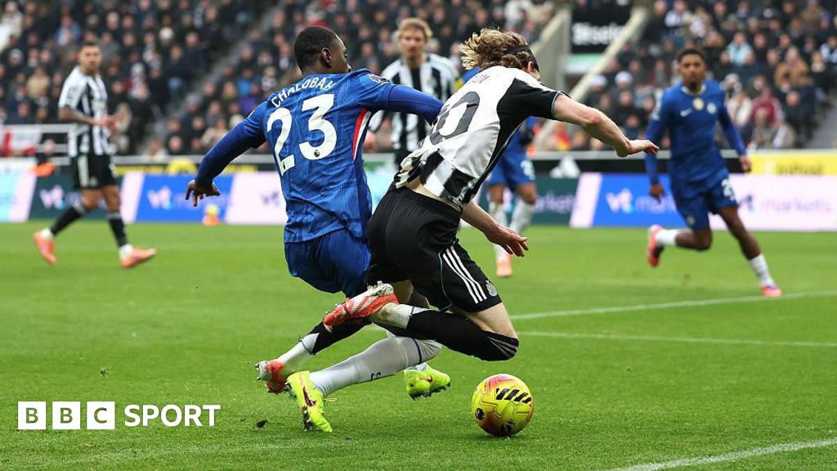 Newcastle forward Anthony Gordon is challenged inside the box by Chelsea defender Trevoh Chalobah