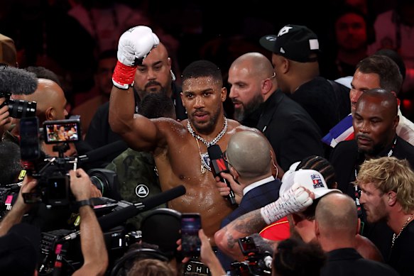 Anthony Joshua celebrates victory over Jake Paul in their heavyweight bout in Miami last week.