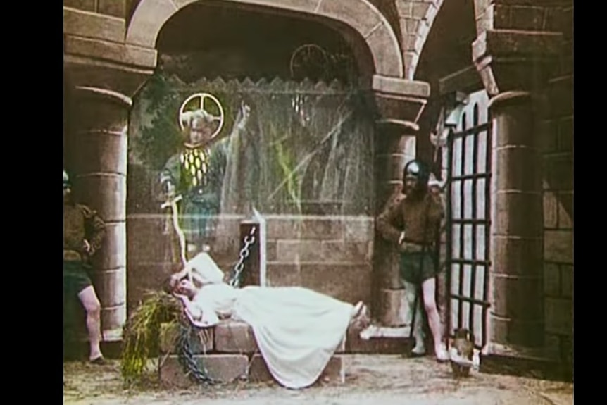 A still frame from a film made in the 1900s. 