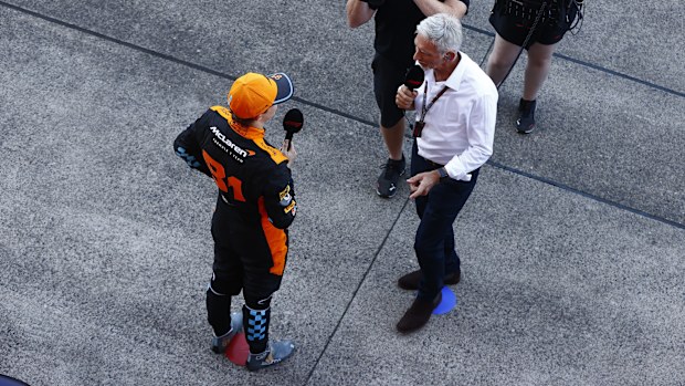 Oscar Piastri is interviewed by Sky Sports broadcaster Damon Hill.