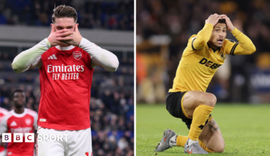 Arsenal celebrate as Wolves look dejected