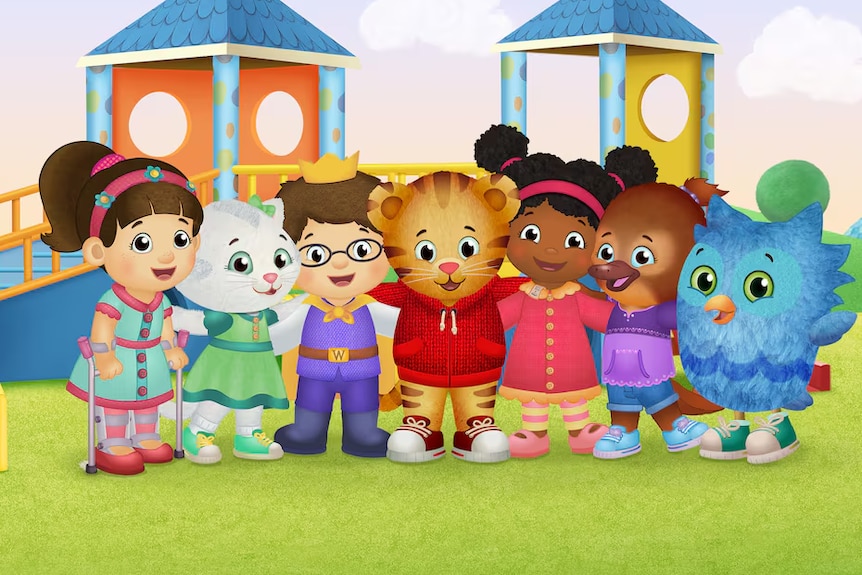 Colourful cartoon children and animals embracing happily in playground
