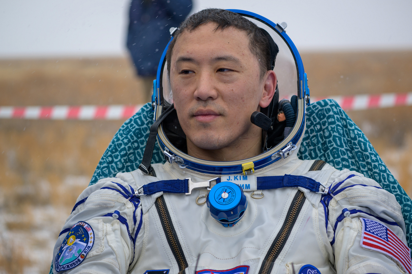 NASA astronaut Jonny Kim is seen outside the Soyuz MS-27 spacecraft after he landed with Roscosmos cosmonauts Sergey Ryzhikov, and Alexey Zubritsky in a remote area near the town of Zhezkazgan, Kazakhstan on Dec. 9. [UPI/YONHAP]
