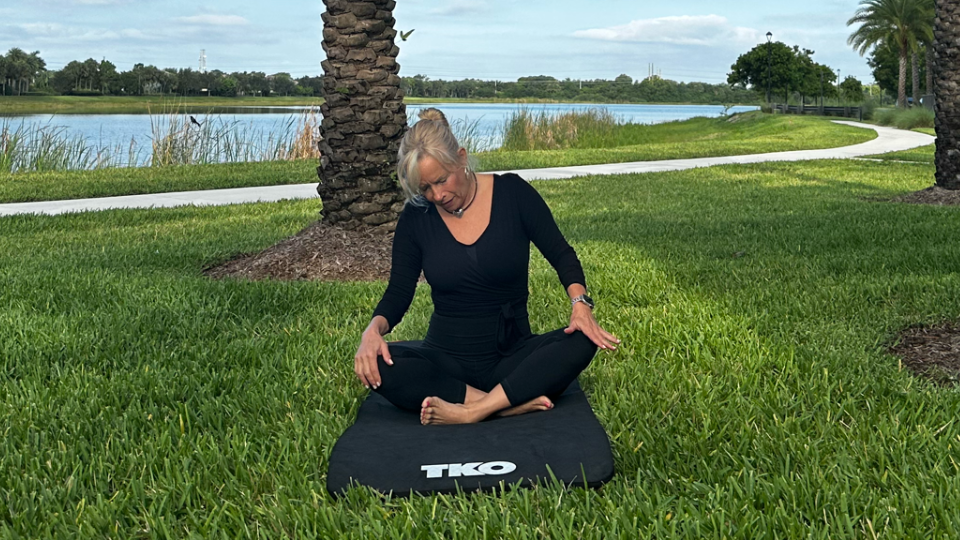 Woman does an outdoor yoga flow