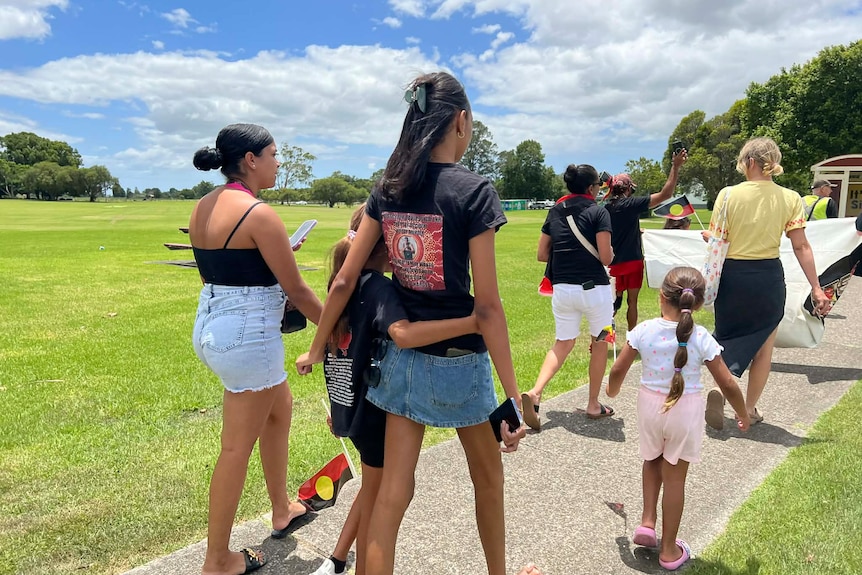 Women and children marching
