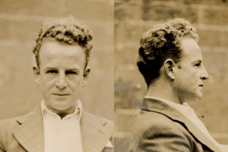 A black and white photo of a man.