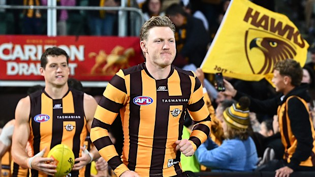 James Sicily  of the Hawks leads out the team during the round 3 AFL match between the  Hawthorn Hawks and GWS Giants