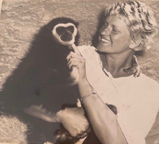 Natasha’s mum Maryke was renowned for her hand-rearing skills. Pictured holding a gibbon. 