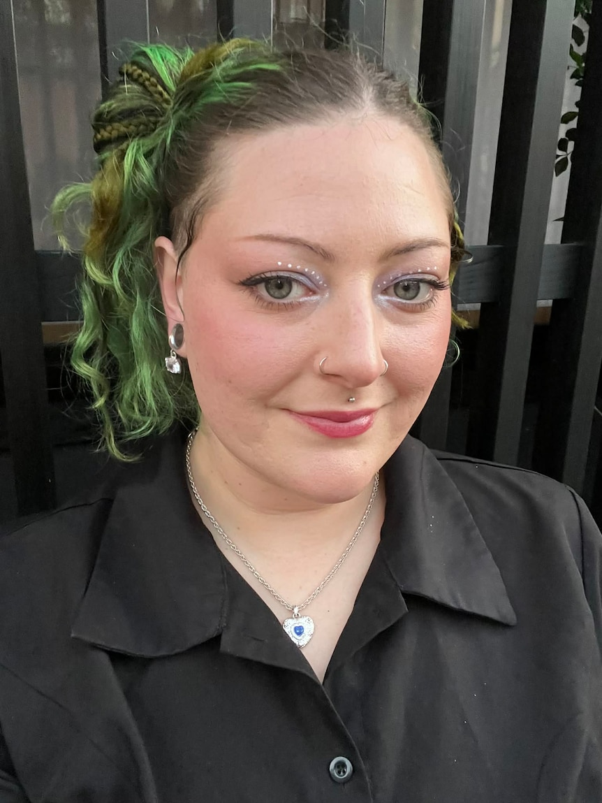 A woman with a black shirt. 