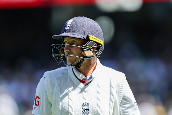 A dejected Joe Root walks from the MCG pitch after being caught behind for a duck.