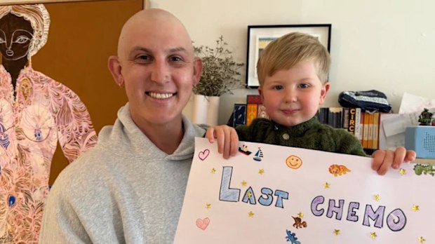 Nic Maddinson and son August celebrating his last chemo appointment. 