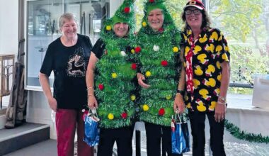 Christmas spirit is alive and well at the Lakes Entrance Golf Club with members Jenny Dowie and Di Gray recently dressing up as Christmas trees for a round. They are pictured with Anita Bertram and Sandi East. (PS)