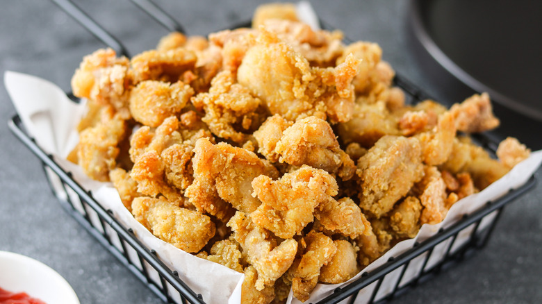 bite-sized pieces of fried chicken in a basket