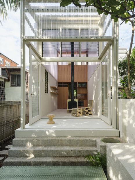 A soaring volume wrapped in polycarbonate admits diffuse light at House in Erskineville by Architect George.