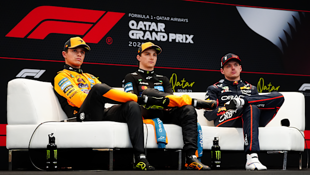 McLaren driver Oscar Piastri (centre) with teammate Lando Norris (left) and Red Bull driver Max Verstappen (right) during the qualifying press conference ahead of the Qatar Grand Prix.