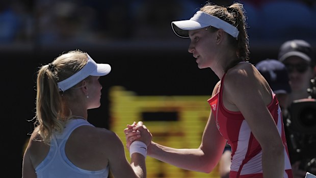 Elena Rybakina, right, of Kazakhstan is congratulated by Emerson Jones of Australia following their first round match at the Australian Open tennis championship in Melbourne, Australia, Tuesday, Jan. 14, 2025. (AP Photo/Ng Han Guan)