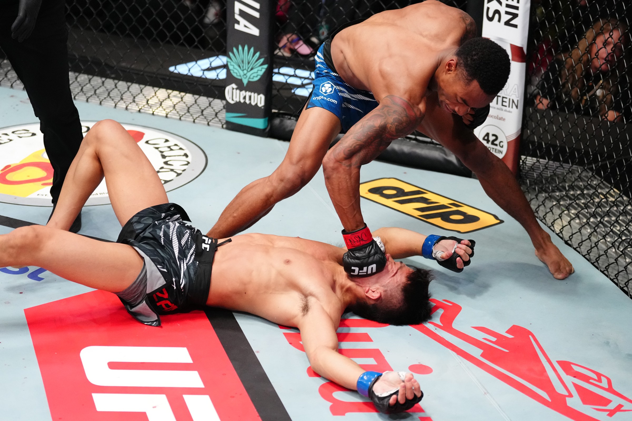 LAS VEGAS, NEVADA - AUGUST 09: (R-L) Elijah Smith knocks out Toshiomi Kazama of Japan in a bantamweight fight during the UFC Fight Night event at UFC APEX on August 09, 2025 in Las Vegas, Nevada. (Photo by Jeff Bottari/Zuffa LLC)
