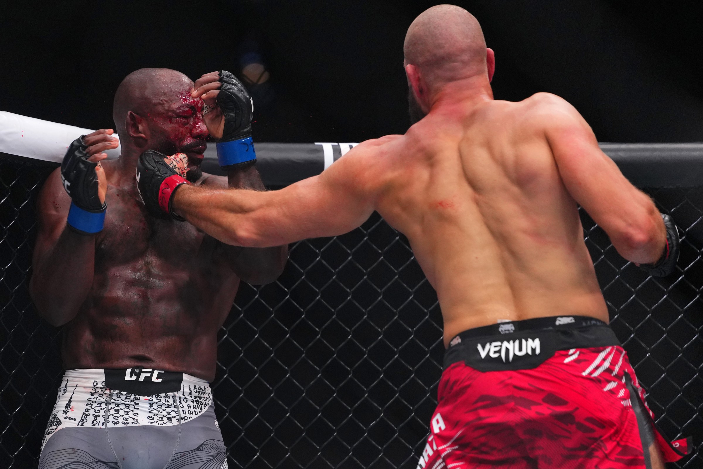 LAS VEGAS, NEVADA - OCTOBER 04: (R-L) Jiri Prochazka of the Czech Republic strikes Khalil Rountree Jr. in a light heavyweight fight during the UFC 320 event at T-Mobile Arena on October 04, 2025 in Las Vegas, Nevada. (Photo by Cooper Neill/Zuffa LLC)