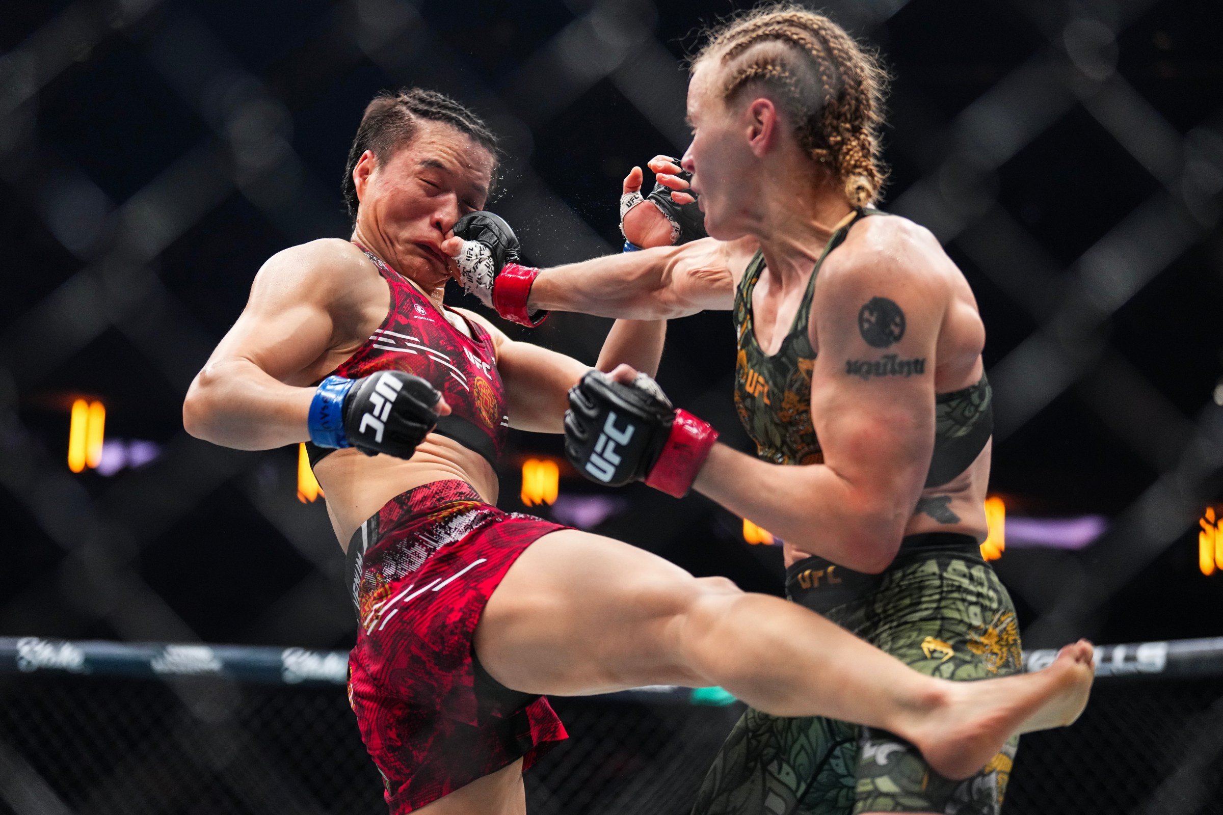 NEW YORK, NEW YORK - NOVEMBER 15: (R-L) Valentina Shevchenko of Kyrgyzstan strikes Zhang Weili of China in the UFC flyweight championship fight during the UFC 322 event at Madison Square Garden on November 15, 2025 in New York City. (Photo by Chris Unger/Zuffa LLC)