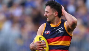 Man charged over alleged threats sent to AFL star