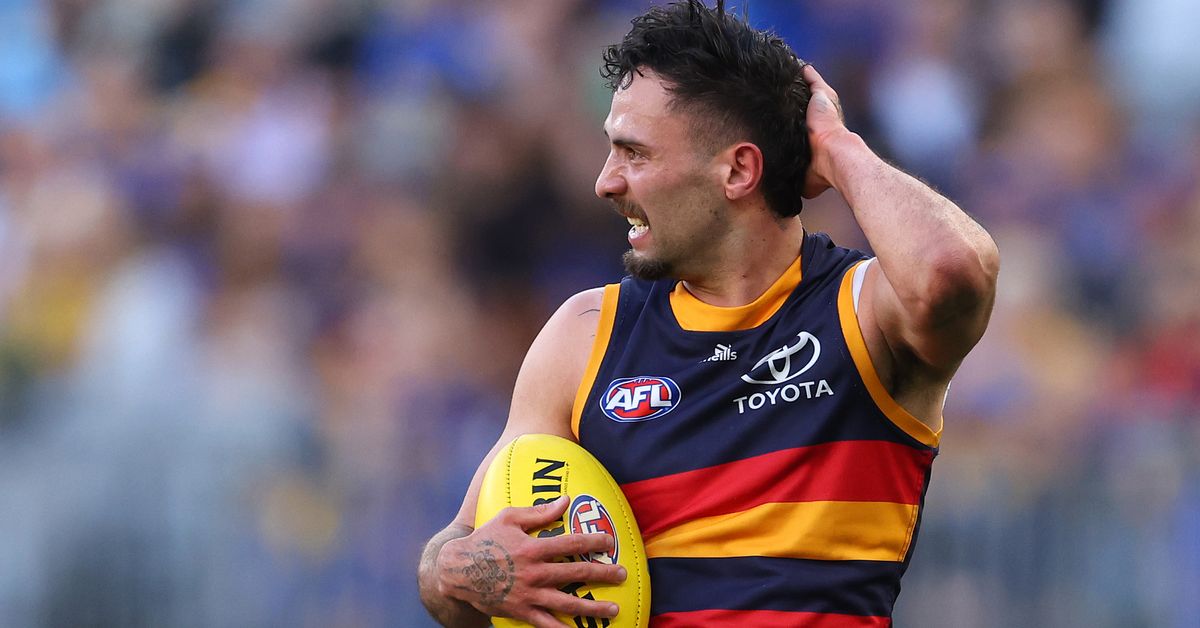 Man charged over alleged threats sent to AFL star