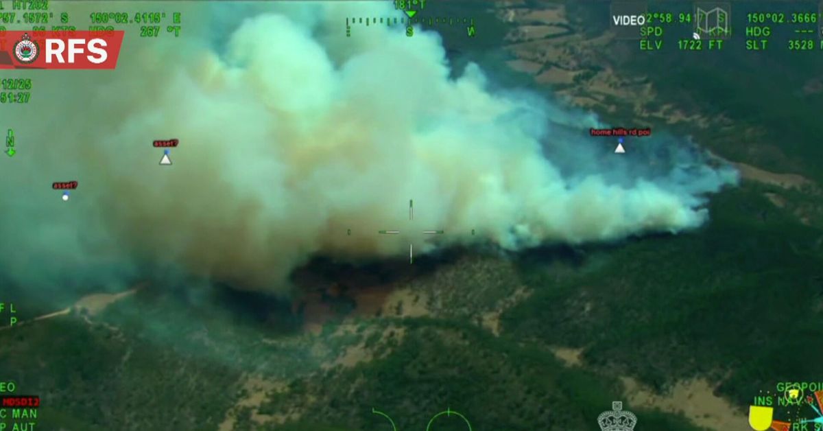 Firefighters issue emergency warning as NSW blaze threatens homes