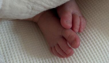 'Absolutely obsessed': AFL star Jordan De Goey and partner Aisha Jade McKinnon welcome first baby together