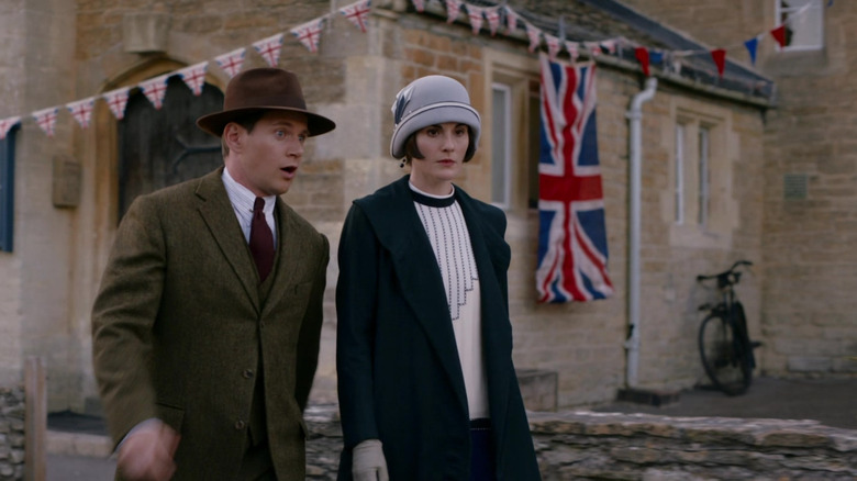 Allen Leech as Tom Branson and Michelle Dockery's Lady Mary prepare for the King in Downton Abbey