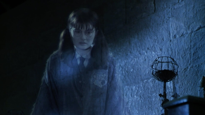 Moaning Myrtle levitating in a hallway in Harry Potter and the Chamber of Secrets