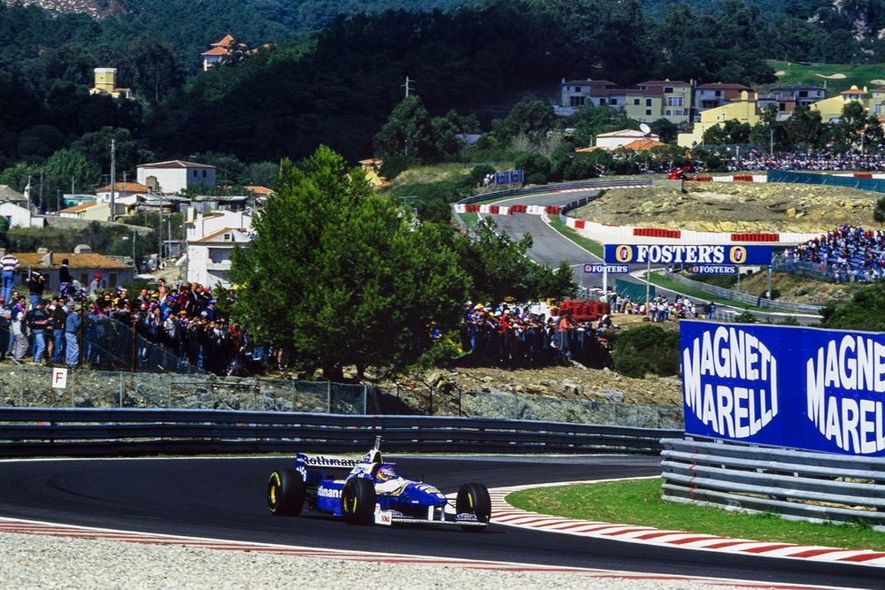 Villeneuve recovered from a poor start in Portugal to keep his title hopes alive