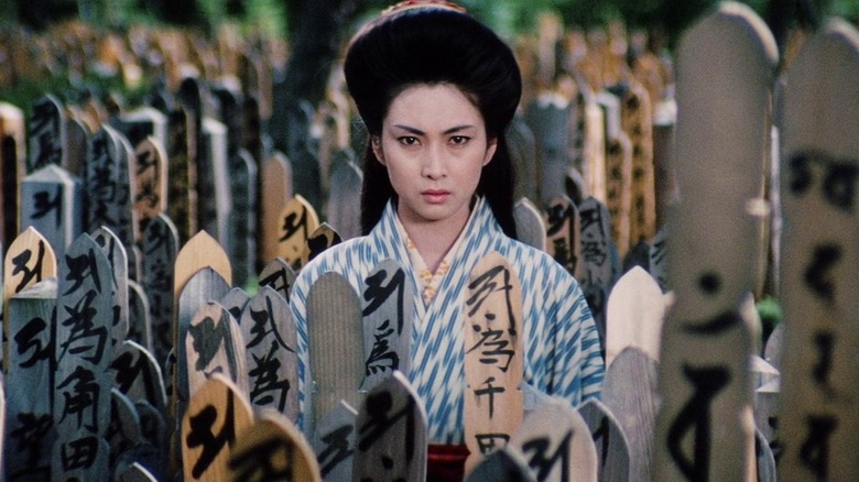 Meiko Kaji as Lady Snowblood standing tall in Lady Snowblood: Love Song of Vengeance