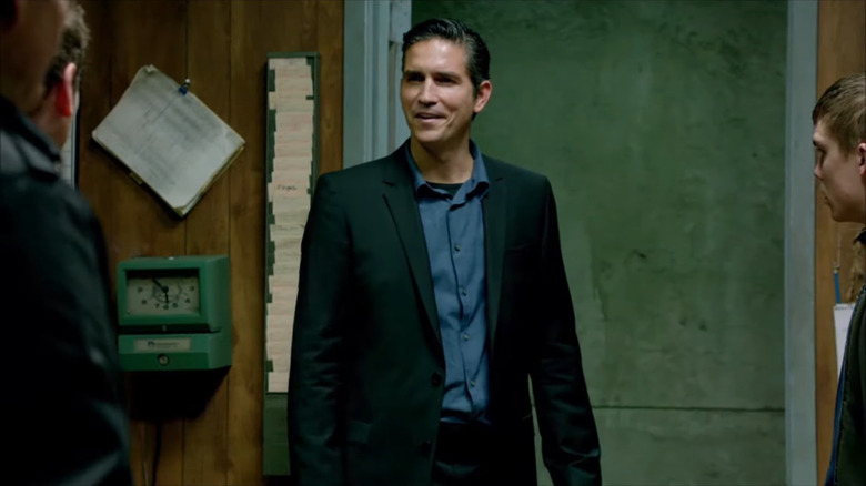 Jim Caviezel's John Reese smiling in Person of Interest