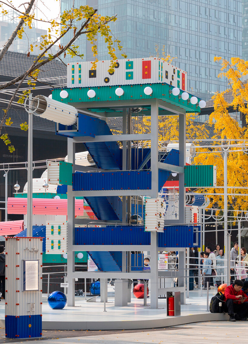 playful rolling ball installation by drawing architecture studio transforms chengdu plaza