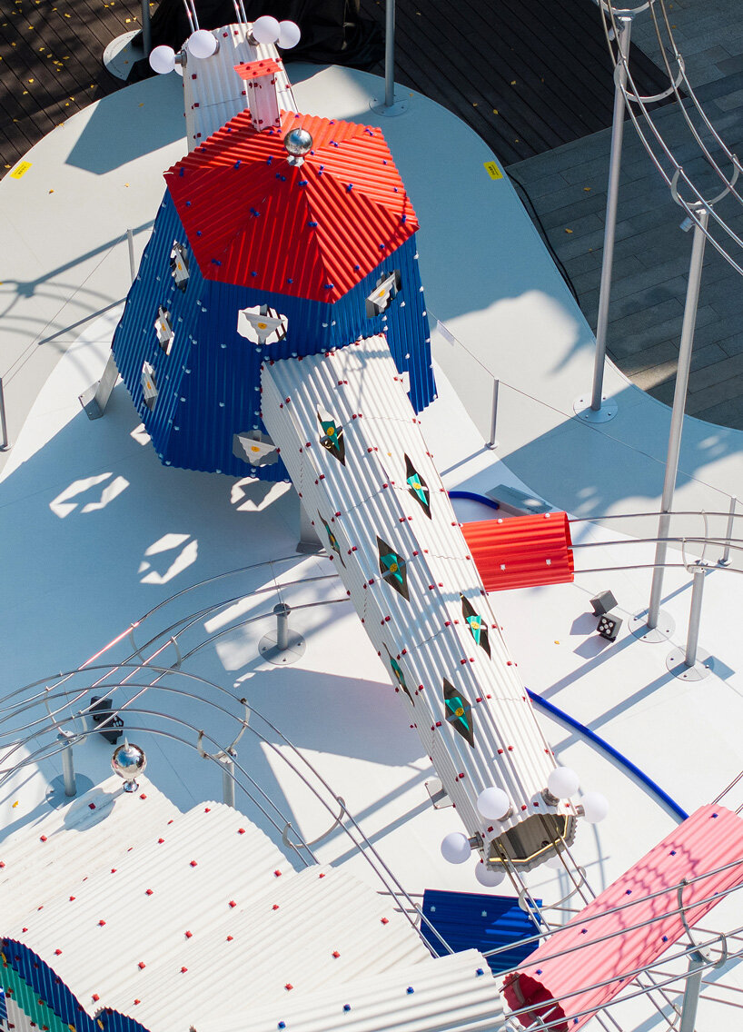 playful rolling ball installation by drawing architecture studio transforms chengdu plaza