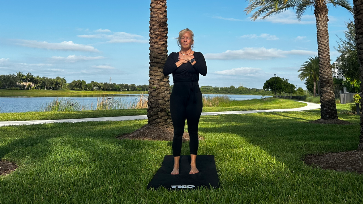 Woman does an outdoor yoga flow