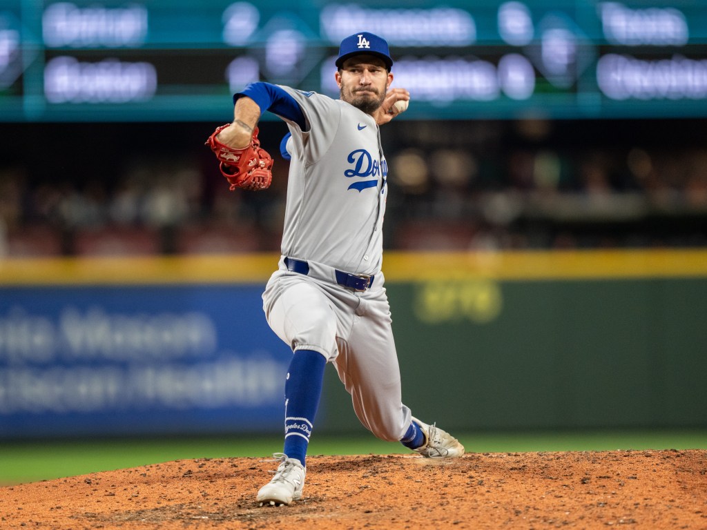 Reliever Andrew Heaney of the Los Angeles Dodgers delivers a pitch during the fifth inning.
