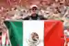 Sergio Pérez Sergio Perez poses for a photo with a Mexico flag prior to the F1 Grand Prix of Mexico at Autodromo Hermanos Rodriguez on October 27, 2024.