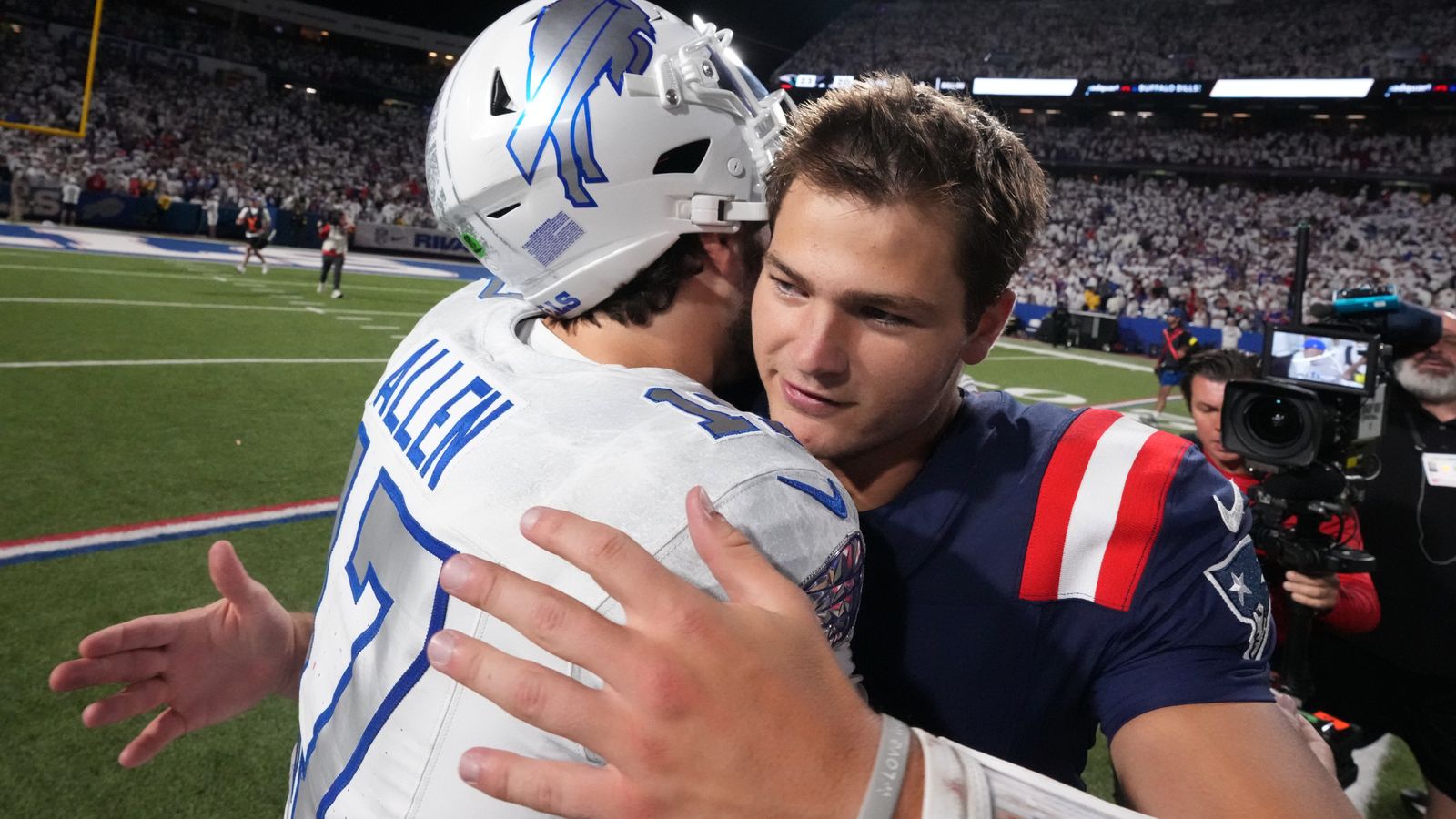 Buffalo Bills quarterback Josh Allen, left, and New England Patriots quarterback Drake Maye, right, greet at midfield after their NFL football game, Sunday, Sept. 5, 2025, in Orchard Park, N.Y. (AP Photo/Gene J. Puskar)