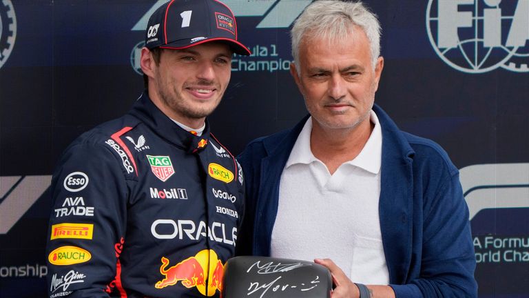 Max Verstappen is presented with his Pirelli tyre for claiming British GP pole by Jose Mourinho