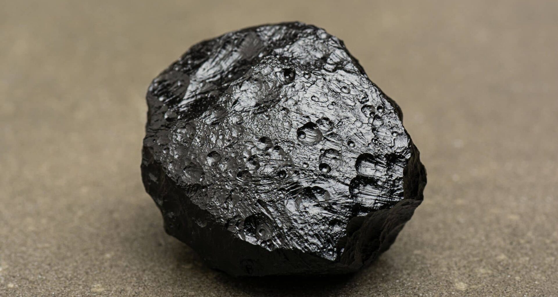 Tektites Are Gravel Sized Bodies Composed Of Natural Black, Green, Brown, Or Grey Glass Formed From Terrestrial Debris Ejected During Meteorite Impacts.