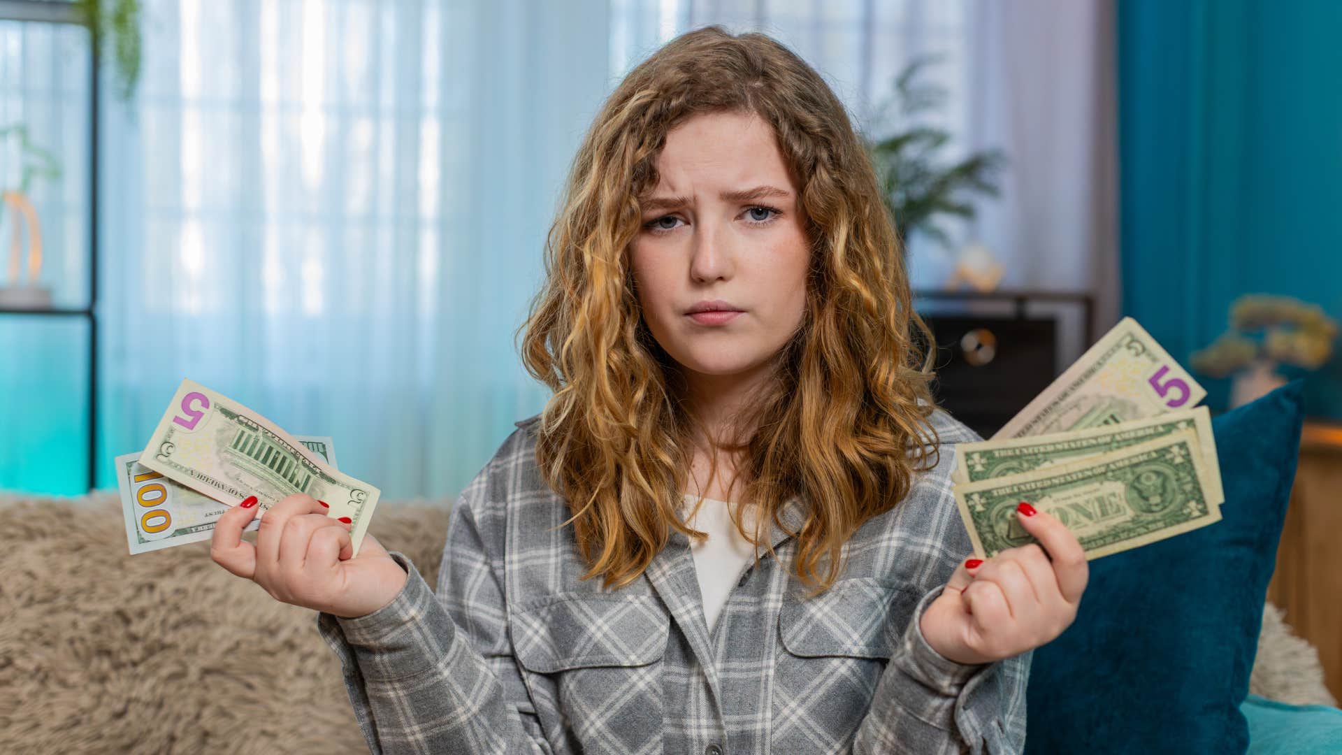 woman who is falling behind financially avoiding talking about large purchases