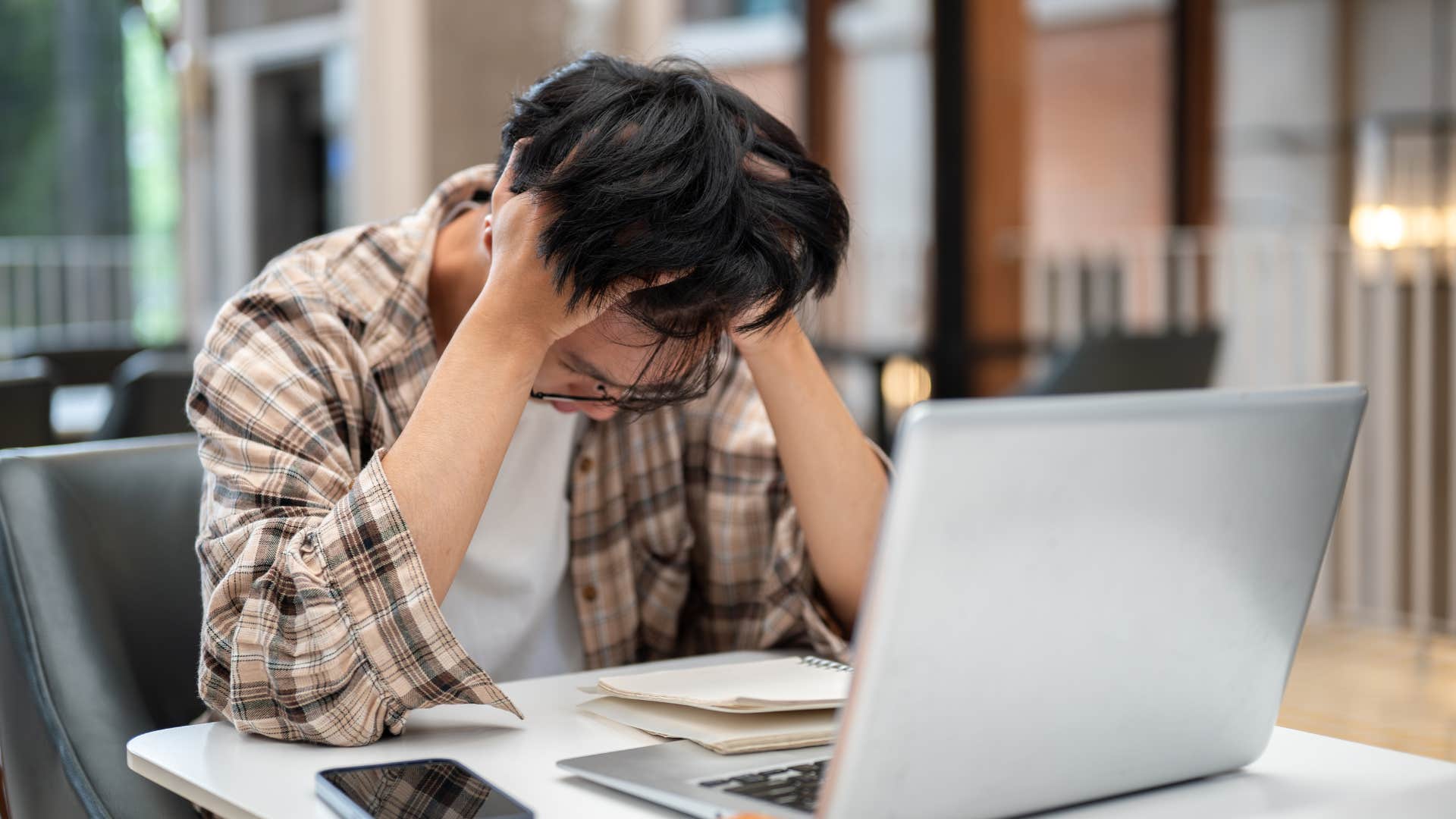 man who is falling behind financially avoiding talking about plans for retirement 