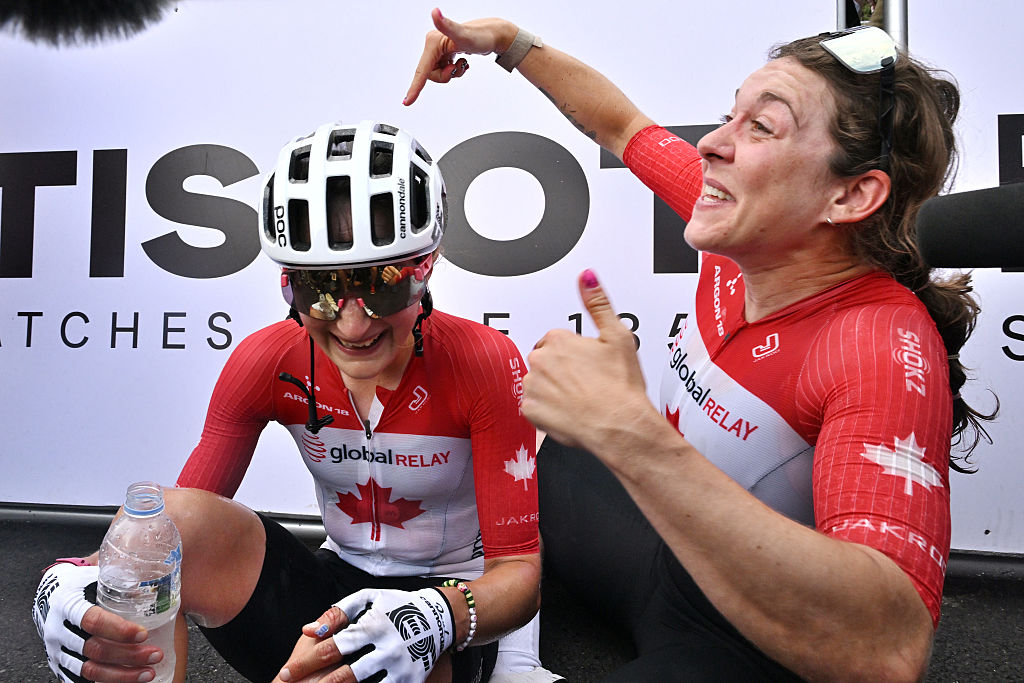 KIGALI, RWANDA - SEPTEMBER 27: (L-R) Gold medalist Magdeleine Vallieres and Team Canada and her team mate Alison Jackson react after the 98th UCI Cycling World Championships Kigali 2025 - Women Elite Road Race a 164.6km race from Kigali to Kigali on September 27, 2025 in Kigali, Rwanda. (Photo by Dario Belingheri/Getty Images)