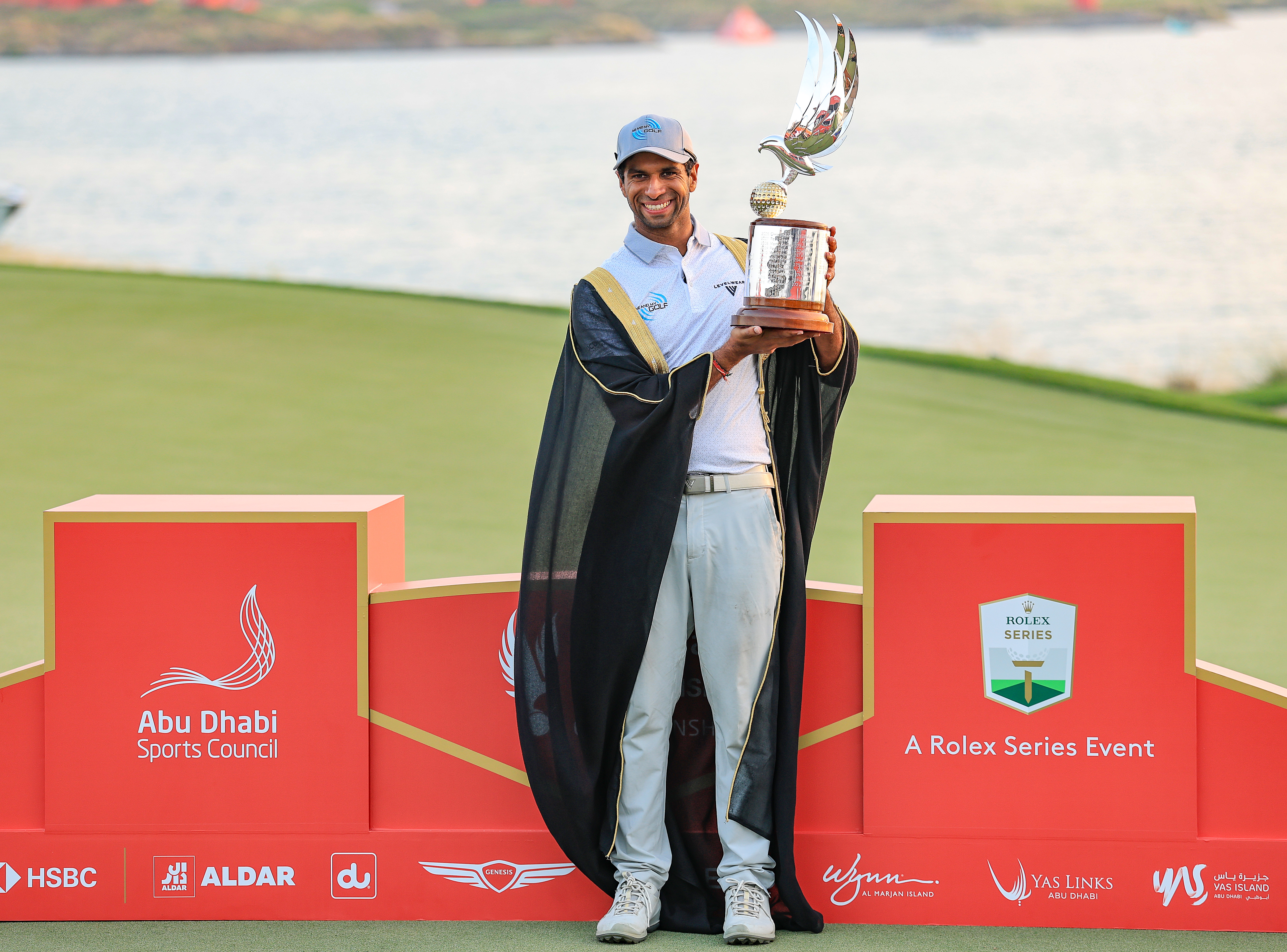 Aaron Rai holds the Abu Dhabi HSBC Championship trophy