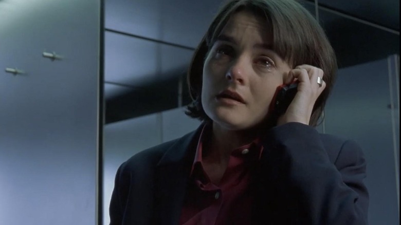 Jude crying in the bathroom on her cell phone in Bridget Jones's Diary