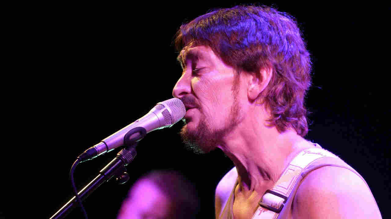 Chris Rea performing onstage in 2004