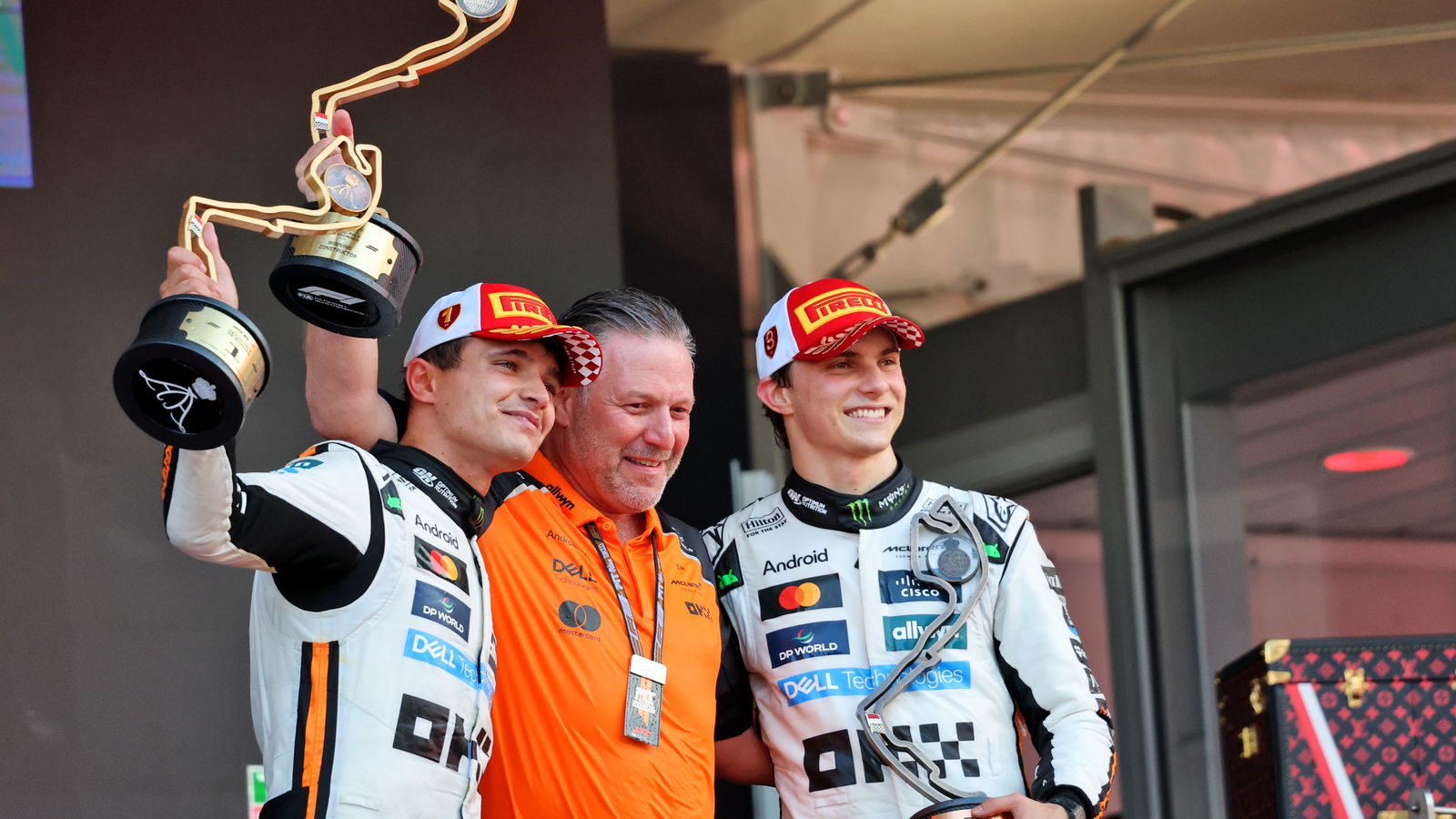 Lando Norris, Zak Brown, Oscar Piastri