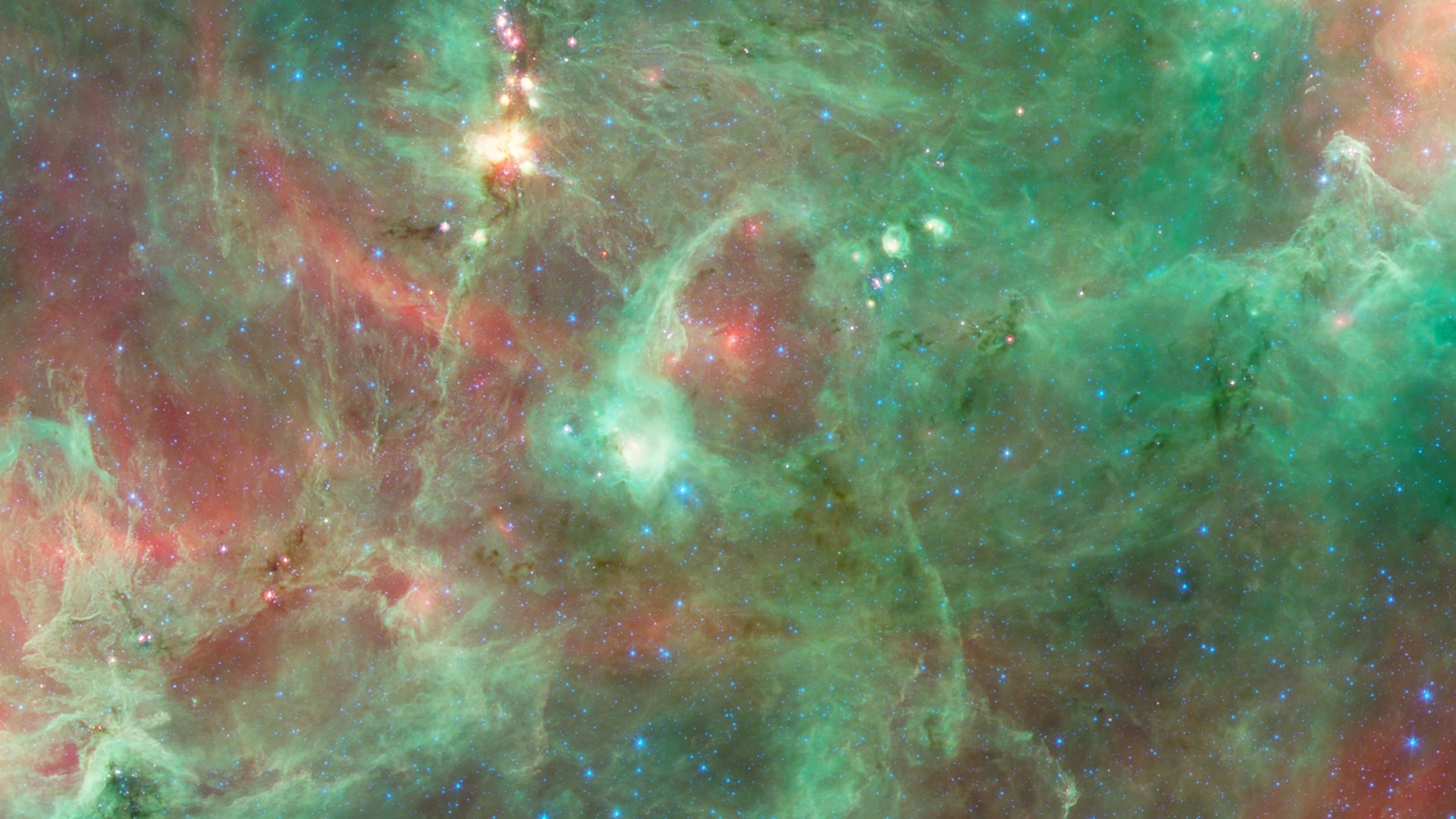 A glowing gas ring in green and red colors in outer space